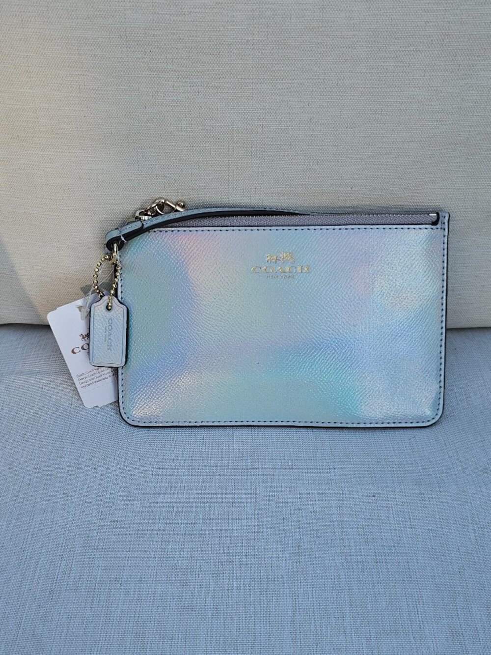 Coach Hologram leather corner zip wristlet